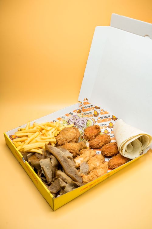 A Munchy Box with 5 Chicken Strips, 4 Chicken Wings, Doner Kebab Salad a Bread and Chips Served at Big Mouth Takeaway Coatbridge
